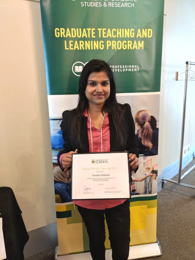 Nandini with her award certificate